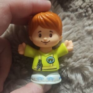 Fisher-Price Little People figure, specifically identified as School Bus Driver